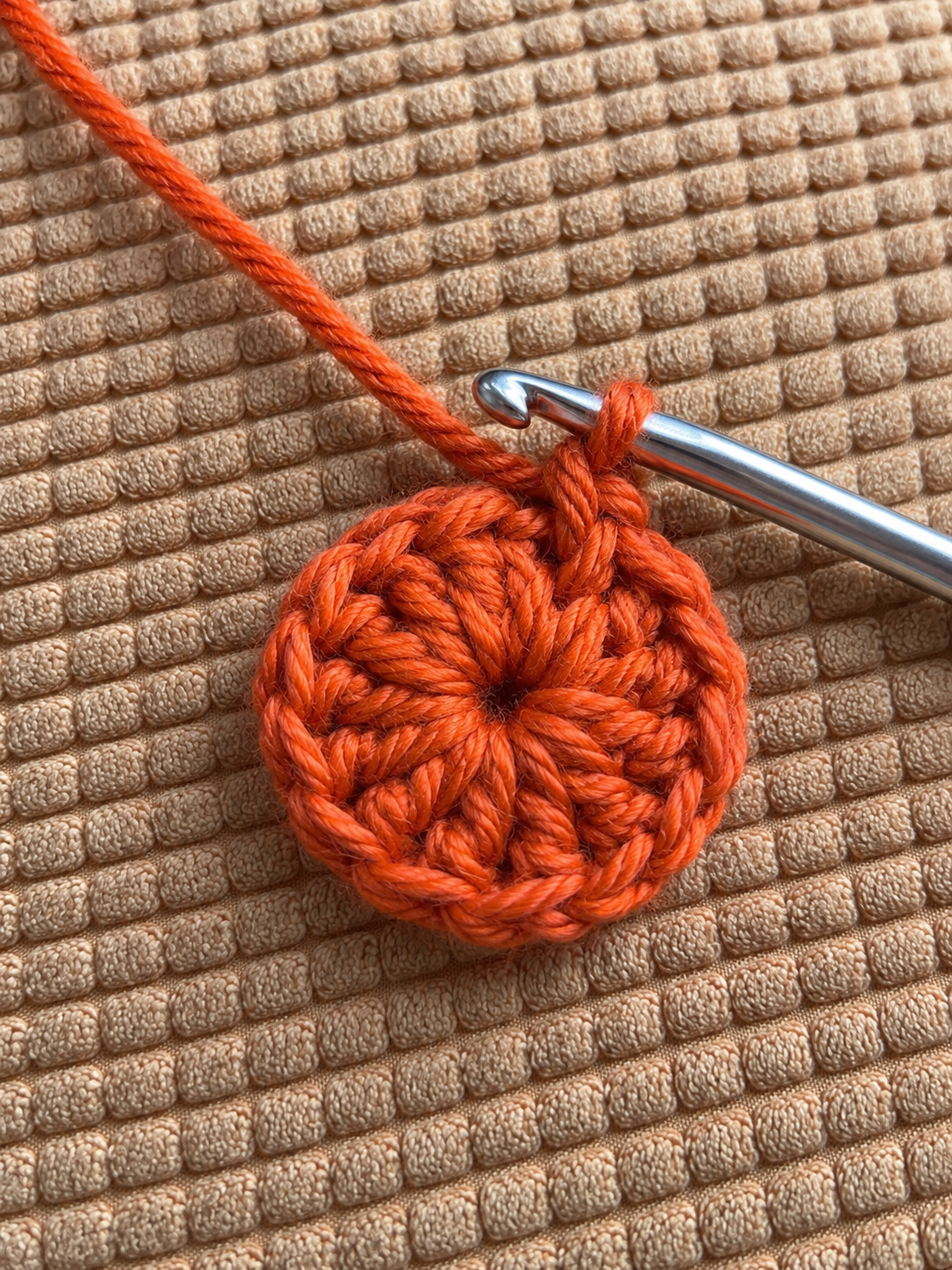 Tightened orange magic ring, first round 2